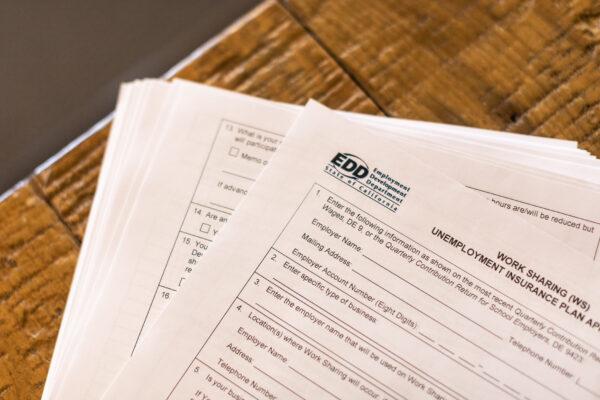 Employment Development Department paperwork in Irvine, Calif., on April 2, 2021. (John Fredricks/The Epoch Times)