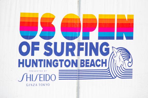 People gather to watch surfers practice for the US Open of Surfing in Huntington Beach, Calif., on Sept. 22, 2022. (John Fredricks/The Epoch Times)