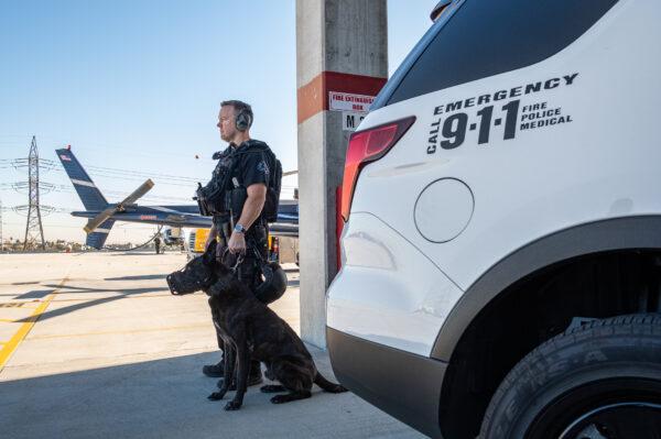 Los Angeles Police Department K9 officers prepare for an operation in Los Angeles on Dec. 13, 2018. (John Fredricks/The Epoch Times)