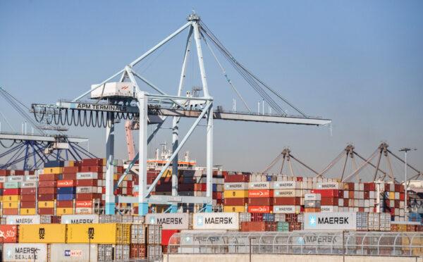 Shipping containers wait to be transferred from the ports of Los Angeles and Long Beach on Oct. 14, 2021. (John Fredricks/The Epoch Times)