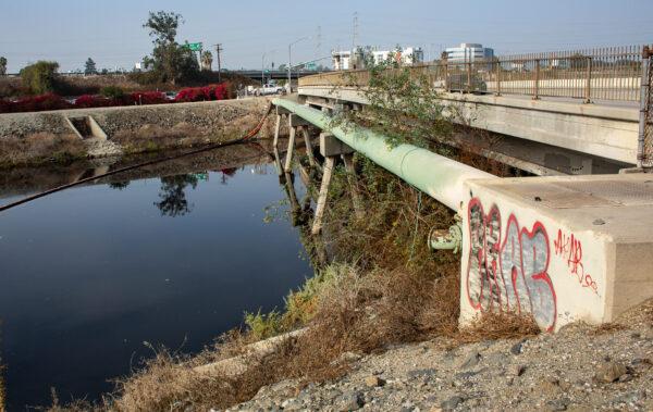 Businesses and residents near The Dominguez Channel have been experiencing a foul odor from the water in Carson, Calif., on Nov. 4, 2021. (John Fredricks/The Epoch Times)