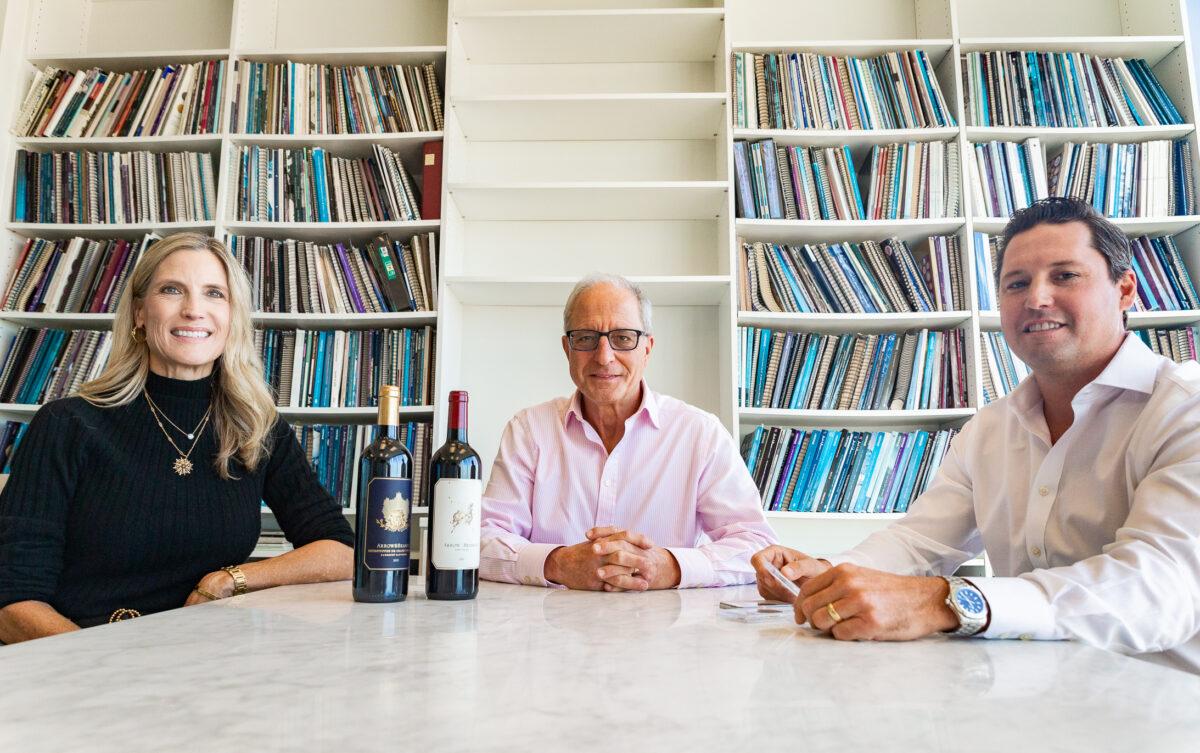 Steve (L), Seanne (C), and son Michael Contursi sit together at the Rare Coin Wholesalers offices in Irvine, Calif., on Oct. 19, 2021. (John Fredricks/The Epoch Times)