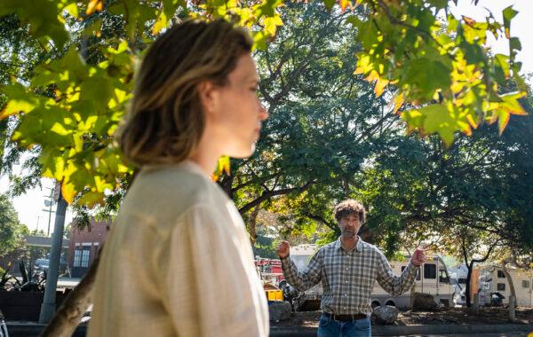 Neighbors discuss homeless encampments on their streets in Venice Beach, Calif., on Nov. 10, 2021. (John Fredricks/The Epoch Times)