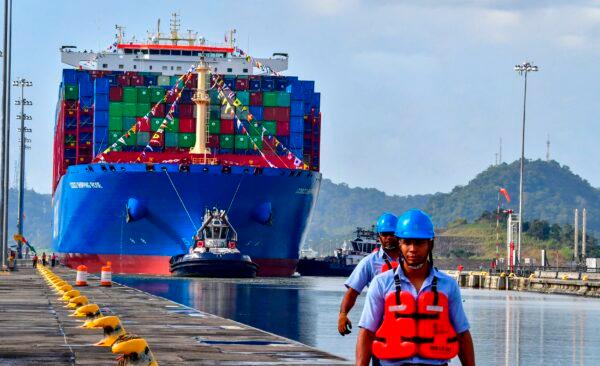 Chinese Cosco Shipping Rose container ship sails near the new Cocoli locks, in the Panama Canal, Panama, on Dec. 3, 2018. (Luis Acosta/AFP via Getty Images)