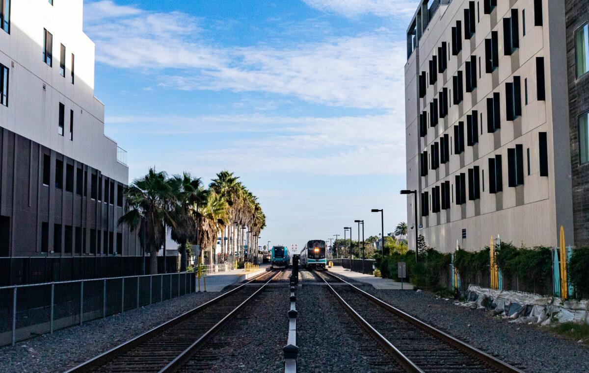 Trains travel on tracks through the city of Oceanside, Calif., on Nov. 2, 2021. (John Fredricks/The Epoch Times)