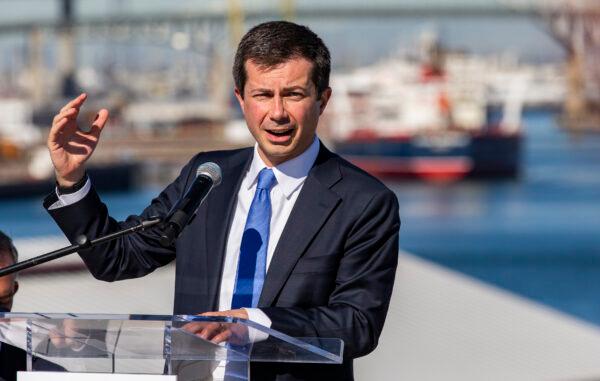 United States Secretary of Transportation Pete Buttigieg speaks to journalists in Long Beach, Calif., on Jan 11, 2022. (John Fredricks/The Epoch Times)