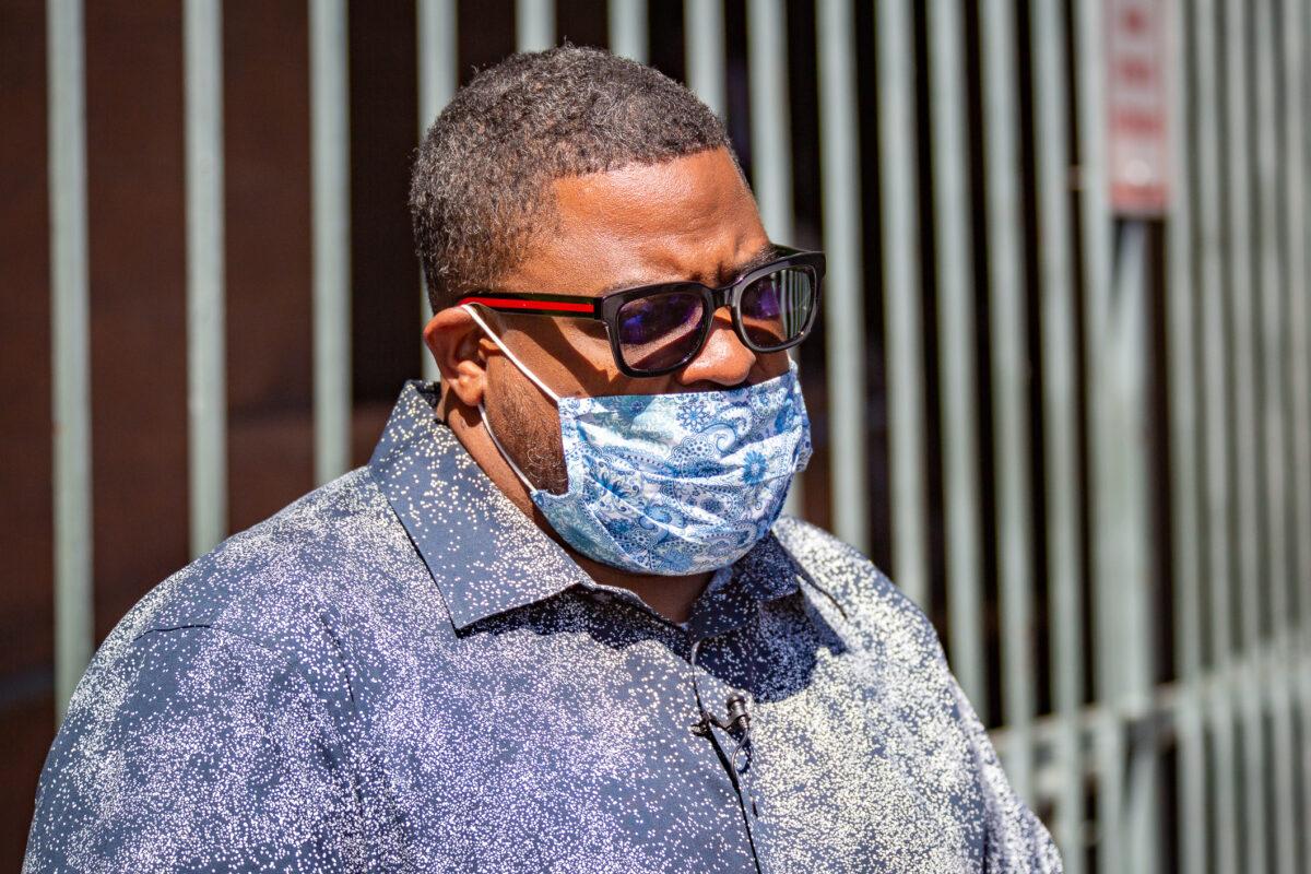 LA Rescue Mission worker Antwone Sanford speaks in front of the building in Skid Row, Los Angeles on June 9, 2021. (John Fredricks/The Epoch Times)