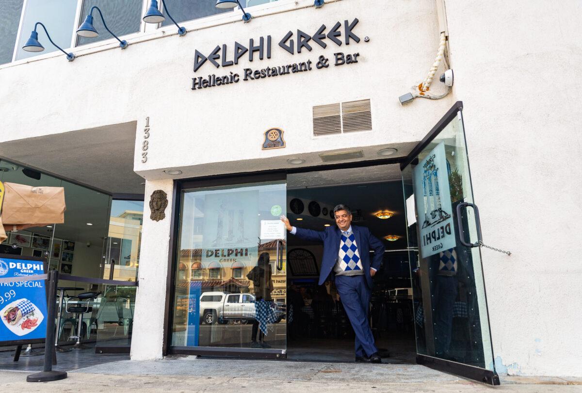Restaurateur and member of the West Los Angeles Chamber of Commerce Roozbeh Farahanipour at stands in his restaurant in Los Angeles, Calif., on Nov. 18, 2021. (John Fredricks/The Epoch Times)