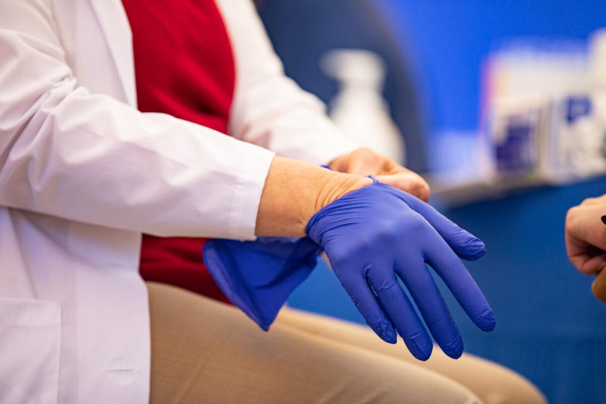 Healthcare workers at St. Joseph Hospital in Orange, Calif., on Dec. 16, 2020. (John Fredricks/The Epoch Times)