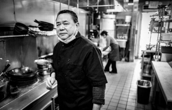 Banny Hong works in the kitchen of Irrawaddy Taste of Burma in Stanton, Calif., on Feb. 01, 2022. (John Fredricks/The Epoch Times)