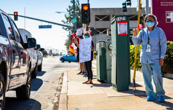 Health care workers protest for the rights of staff and patients at West Anaheim Medical Center in Anaheim, Calif., on Feb. 14, 2022. (John Fredricks/The Epoch Times)