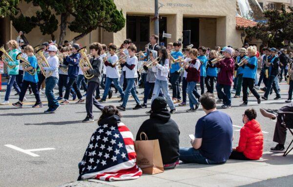 Southern Californians partake in the 55th Annual Patriots Day Parade in Laguna Beach, Calif., on March 5, 2022. (John Fredricks/The Epoch Times)