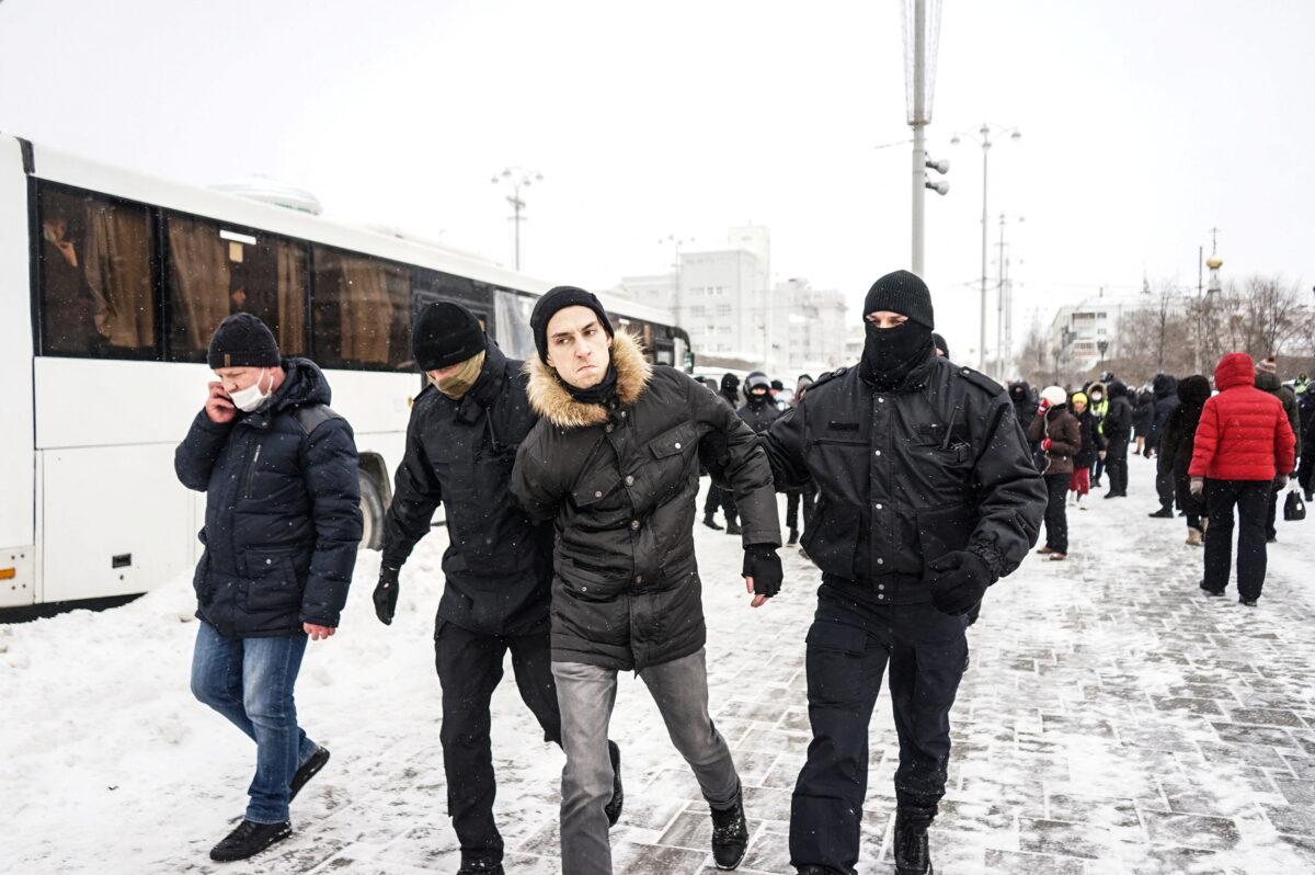 A person is detained during an anti-war protest, following Russia's invasion of Ukraine, in Yekaterinburg, Russia, on March 6, 2022. (Handout via Reuters)