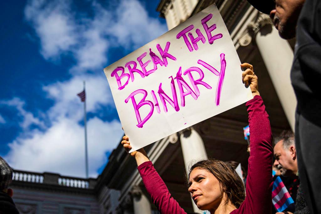 Activists show support for transgender people on the steps of City Hall in New York on Oct. 24, 2018. (Drew Angerer/Getty Images)
