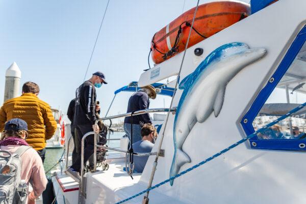 People enjoy Captain Daves Dolphin and Whale Watching Safari in Dana Point, Calif., on March 8, 2021. (John Fredricks/The Epoch Times)