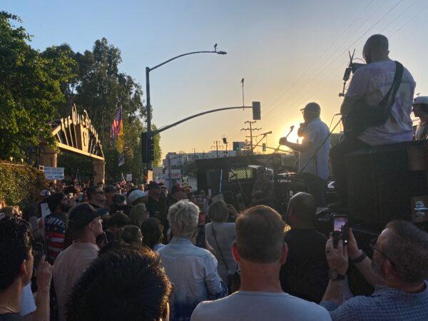 Protestors rally in opposition to The Walt Disney Company's stance against a recently passed Florida law outside of the company's headquarters in Burbank, Calif., on April 6, 2022. (Jill McLaughlin/The Epoch Times)