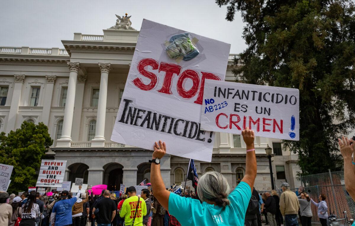 People rally against Assembly Bill 2223 in Sacramento on April 19, 2022. (John Fredricks/The Epoch Times)