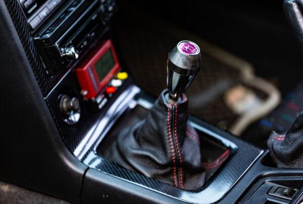 The gear shifter of a street racing car sits on display in Santa Ana, Calif., on April 29, 2022. (John Fredricks/The Epoch Times)