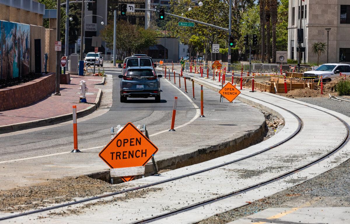 Construction for an upcoming trollycar system is underway in Santa Ana, Calif., on May 4, 2022. (John Fredricks/The Epoch Times)