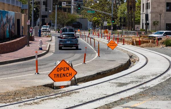 Construction for an upcoming trollycar system is underway in Santa Ana, Calif., on May 4, 2022. (John Fredricks/The Epoch Times)