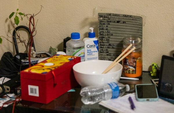 The office area of an illegal gambling operation displays a debt list for gambling customers after being raided by police officers in Westminster, Calif., on May 10, 2022. (John Fredricks/The Epoch Times)
