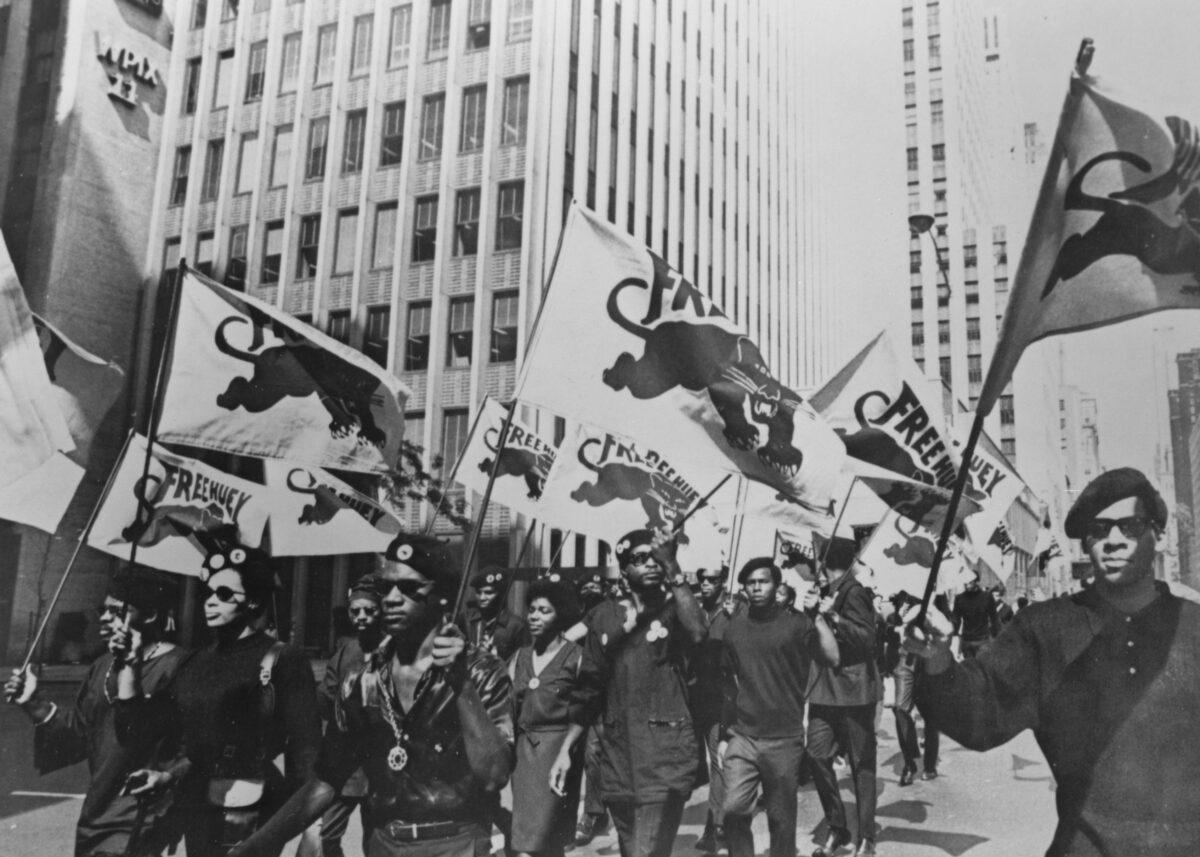 Black Panthers march to a news conference to protest at the trial of one of their members Huey P. Newton in New York, July 22, 1968. (MPI/Getty Images)