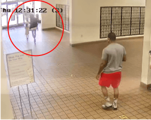 Two people who allegedly followed a woman home from a post office and then robbed her at gunpoint on May 12, 2022, while she was taking her two young daughters out of their car seats in Hancock Park were behind bars on May 20, 2022. (Courtesy of Los Angeles Police Department)