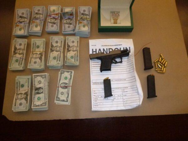 Two people who allegedly followed a woman home from a post office and then robbed her at gunpoint on May 12, 2022, while she was taking her two young daughters out of their car seats in Hancock Park were behind bars on May 20, 2022. (Courtesy of Los Angeles Police Department)