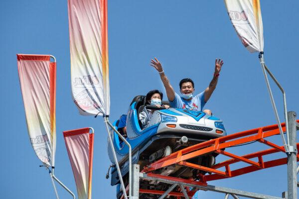 People enjoy the opening day of the Orange County Fair in Costa Mesa, Calif., on July 16, 2021. (John Fredricks/The Epoch Times)