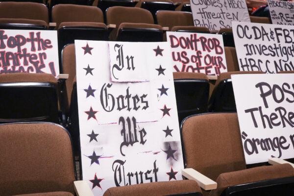 Signs show support for Huntington Beach City Attorney Michael Gates in Huntington Beach, Calif., on June 7, 2022. (Julianne Foster/The Epoch Times)