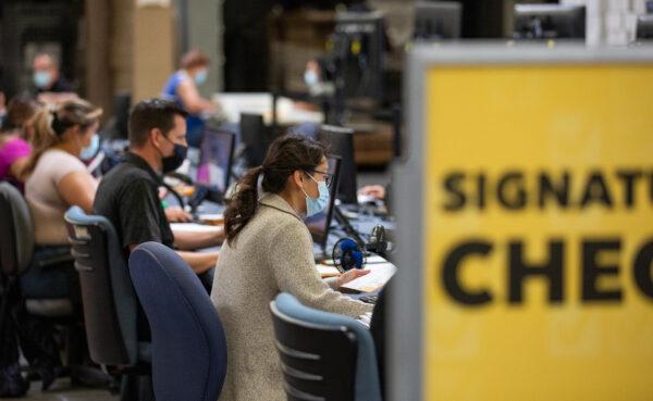 Voting ballots are audited at the Orange County Registrar of Voters office in Santa Ana, Calif., on June 9, 2022. (John Fredricks/The Epoch Times)