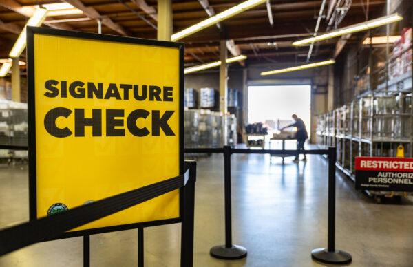 Voting ballots are audited at the Orange County Registrar of Voters office in Santa Ana, Calif., on June 9, 2022. (John Fredricks/The Epoch Times)