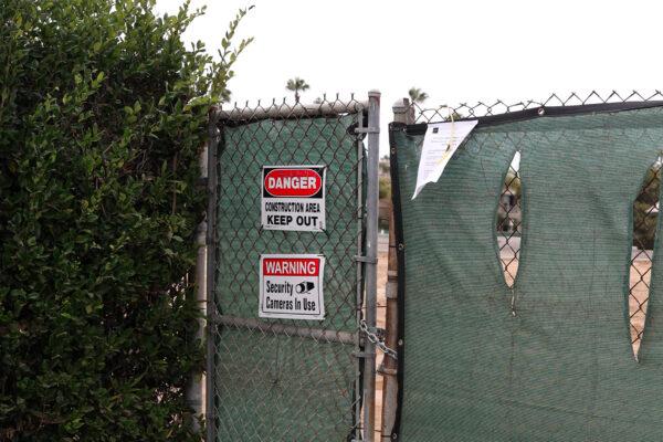 A new community park at the crossing of 17th Street and Orange Avenue in Huntington Beach, Calif., is under construction on June 10, 2022. (Julianne Foster/The Epoch Times)