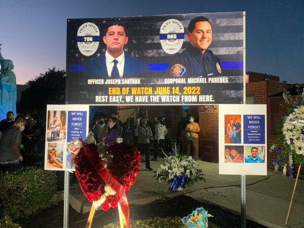 In honor of two El Monte police officers killed in a recent motel shooting, more than a thousand community members, law enforcement officers, and family members gathered at a candlelight vigil outside the El Monte Civic Center in El Monte, Calif., on June 18, 2022. (Linda Jiang/The Epoch Times)