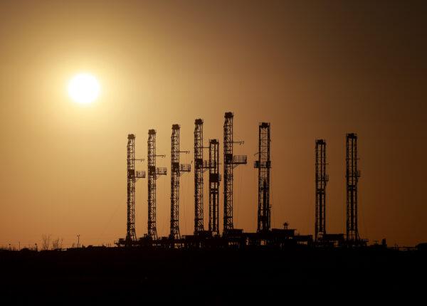 Drilling rigs sit unused on a company's lot located in the Permian Basin area in Odessa, Texas, on March 13, 2022. (Joe Raedle/Getty Images)