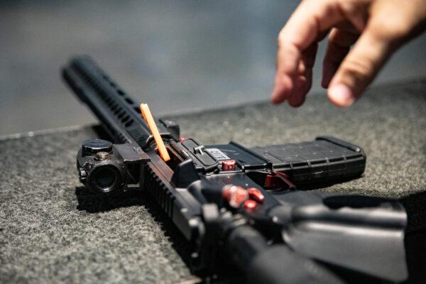 An assault-style rifle prepares to be loaded at a shooting range in Stanton, Calif., on May 3, 2021. (John Fredricks/The Epoch Times)