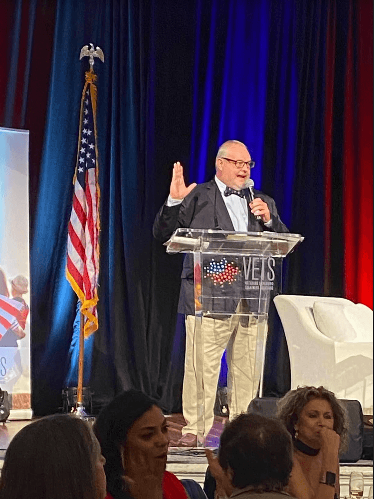 Lewandowski conducting a live auction for a veterans charity at Hotel Del Coronado last Veterans Day. (Courtesy of Steve Lewandowski)