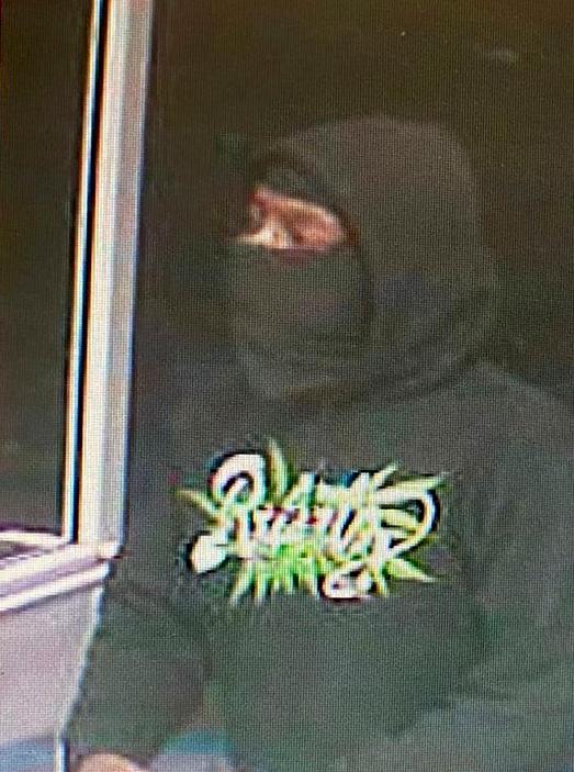 A person police are seeking in connection with a robbery at a 7-Eleven store in Ontario, Calif., on July 11, 2022. (Ontario Police Department via AP)