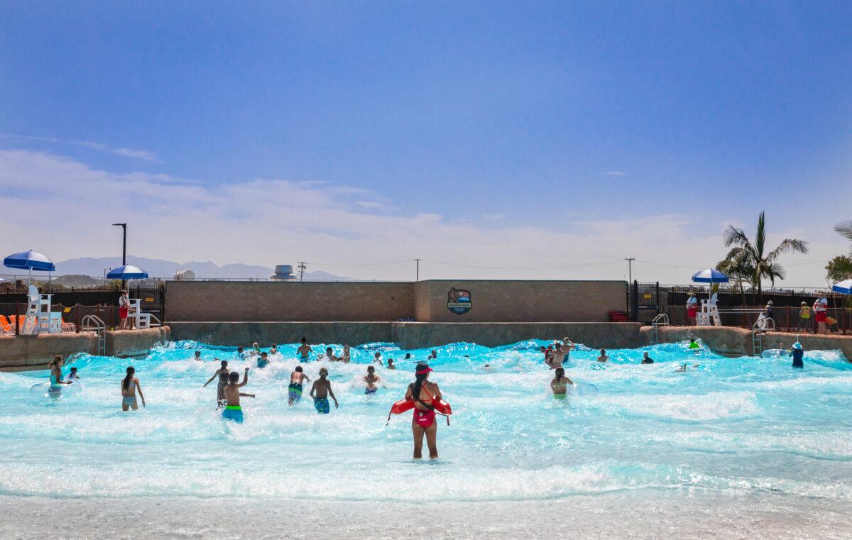 Guests enjoy the soft opening of Wild Rivers water park in Irvine, Calif., on July 14, 2022. (John Fredricks/The Epoch Times)