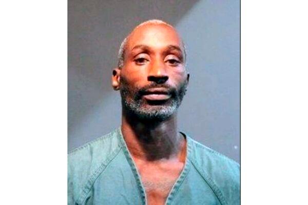 This booking photo released by the Santa Ana Police Department shows suspect Jason Payne, 44, of Los Angeles, on Friday, July 15, 2022. Authorities said Saturday, July 16 that Payne and Malik Patt were arrested Friday in connection with a series of deadly robberies at Southern California 7-Eleven stores. (Santa Ana Police Department via AP)