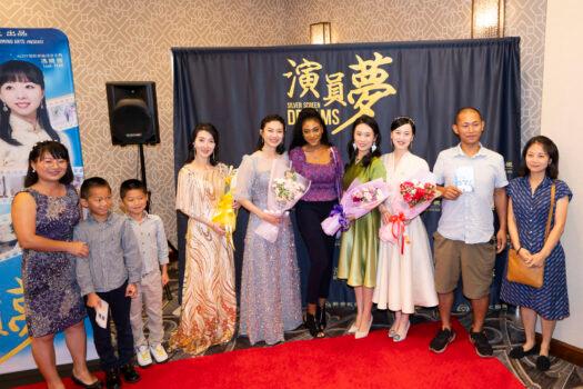 Audience members taking pictures with the production cast at the premiere in Los Angeles on Sept. 9, 2022. (Debora Cheng/The Epoch Times)