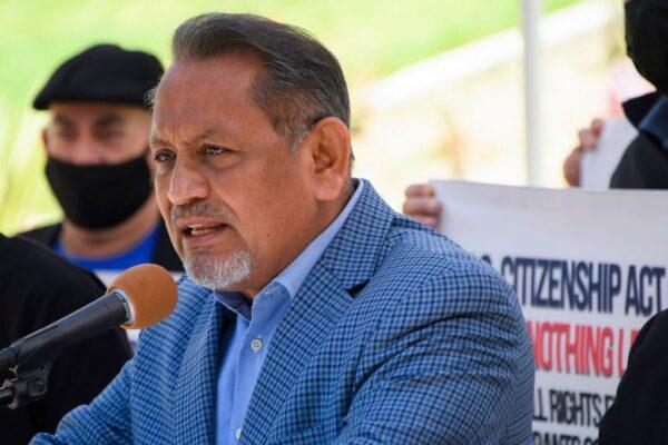 Los Angeles City Councilman Gil Cedillo (L) speaks about the US Citizenship Act of 2021 and urges action on US President Biden's immigration reform plan outside of City Hall in Los Angeles on April 29, 2021. (Patrick T. Fallon/AFP via Getty Images)