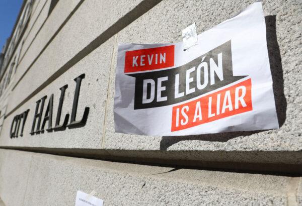 A sign denouncing L.A. City Council member Kevin de Leon is posted outside City Hall in the wake of a leaked audio recording in Los Angeles, Calif., on October 18, 2022. (Mario Tama/Getty Images)