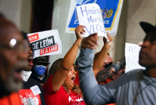 Protestors demonstrate as the Los Angeles City Council holds its first in-person meeting since voting in new president Paul Krekorian in the wake of a leaked audio recording in Los Angeles on Oct. 25, 2022. (Mario Tama/Getty Images)