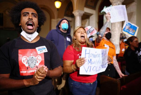 Protestors demonstrate as the Los Angeles City Council holds its first in-person meeting since voting in new president Paul Krekorian in the wake of a leaked audio recording in Los Angeles on Oct. 25, 2022. (Mario Tama/Getty Images)