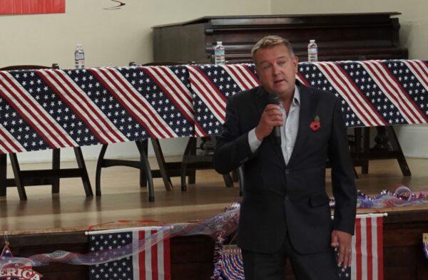 Kelly Ernby's husband, Axel Ernby, speaks at Ebell Club in Santa Ana, Calif., on Nov. 2, 2022. (Rudy Blalock/The Epoch Times)