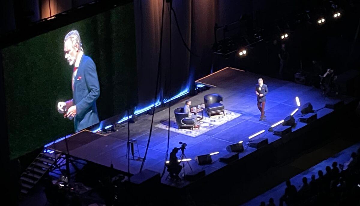 Jordan Peterson talks on stage at the Honda Center in Anaheim, Calif., on Nov. 3, 2022. (Carol Cassis/The Epoch Times)