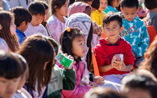 Children sit in on a school assembly for a program that educates students about dairy products at Ethel M. Evans Elementary School in Garden Grove, Calif., on Nov. 15, 2022. (John Fredricks/The Epoch Times)