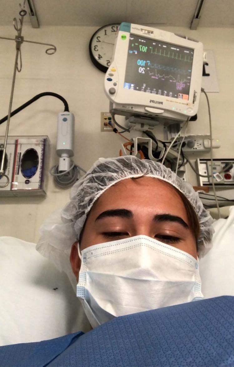 Chloe Cole, 15, wakes up from her mastectomy operation. (Courtesy of Chloe Cole)