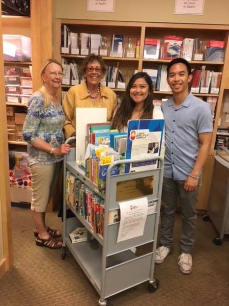 Charlotte Perry (2nd from Left) with the yellow blouse with students from the University of San Deigo and their sponsor Pat Zoller (L). (Courtesy of Charlotte Perry)